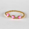 Pulsera bolitas ojo rosa resorte