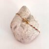 Pulsera moño zirconea naranja