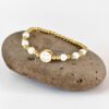 Pulsera carita blana con perla